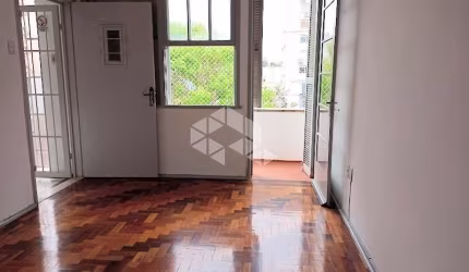 Apartamento 2 dormitórios com sacada.