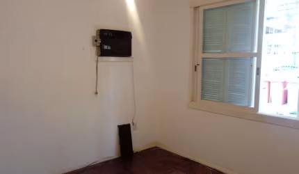Apartamento térreo dois dormitórios vaga rotativa.