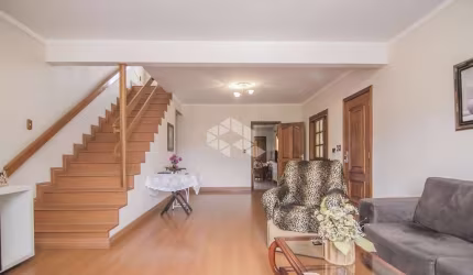 Casa com 2 dormitórios com 2 vagas, no bairro Partenon em Poa/Rs.
