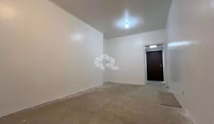 Apartamento com 3 quartos e 100m², com vaga, à venda no Menino Deus, Porto Alegre.