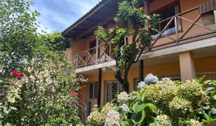 VENDE CASA 4 DORMITÓRIOS COM 2 VAGAS DE GARAGEM PARTENON