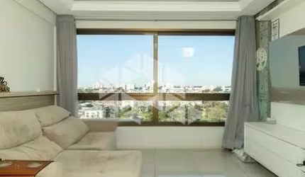Apartamento  2 dormitórios, sendo 1 suíte, semimobiliado, lareira e churrasqueira.