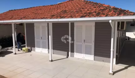 Casa à venda  com 3 dormitórios e piscina na Praia do Sonho - Palhoça / SC.