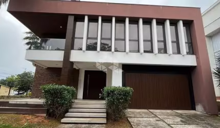 Casa com vista para o mar em condomínio fechado em Cacupé.