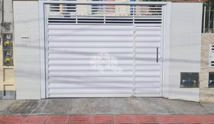 CASA GEMINADA 2 DORMITÓRIOS SEMI MOBILIADA 1 VAGA DE GARAGEM FORQUILHAS SÃO JOSÉ/SC