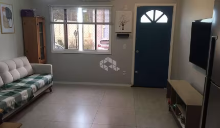 CASA EM CONDOMÍNIO 2 QUARTOS E 1 VAGA DE GARAGEM NO BAIRRO CAVALHADA