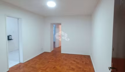 Apartamento 2 dormitórios com garagem no Menino Deus