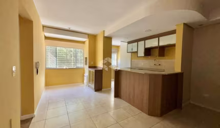 Apartamento 2 dormitórios churrasqueira semi- mobiliado uma garagem
