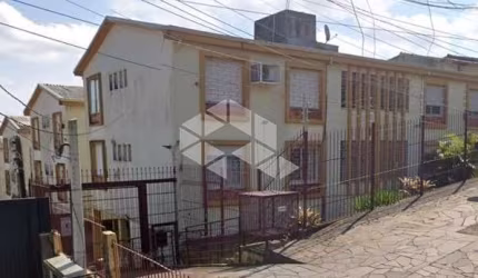 Apartamento 01 dormitório, 3º pavimento, 50m2 totais, 38m2 privativos, com vaga rotativa na Medianeira - Poa/Rs.