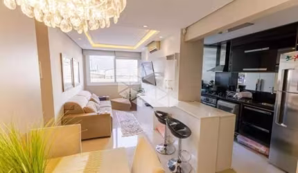 Apartamento 2 dormitórios suíte cozinha americana a churrasqueira 1 garagem semi mobiliado infra completa