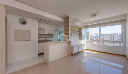 Apartamento de 65m2 de 2 dormitórios, uma suite com 2 banheiro e 1 vaga e semi-mobiliado