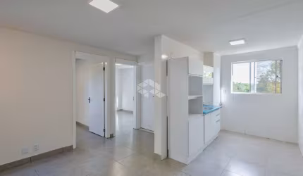 Apartamento reformado, 2 dormitórios, cozinha integrada com sala de estar, estacionamento, quiosque, bairro Santo Afonso, em Novo Hamburgo.