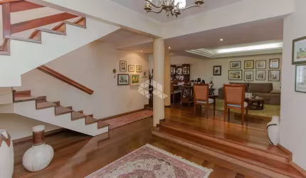 Casa de 4 dormitórios e 4 vagas a venda no bairro petropolis