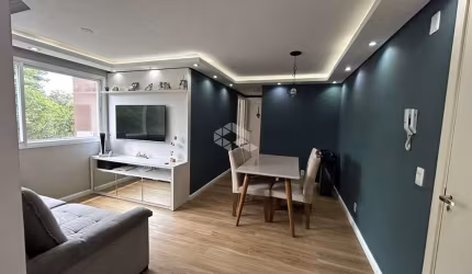 Apartamento de 02 dormitórios semimobiliado no bairro Vila Nova