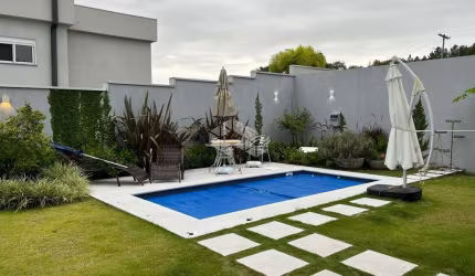 CASA COM 4 SUÍTES E PISCINA NO ALPHAVILLE  VENETO - PORTO ALEGRE