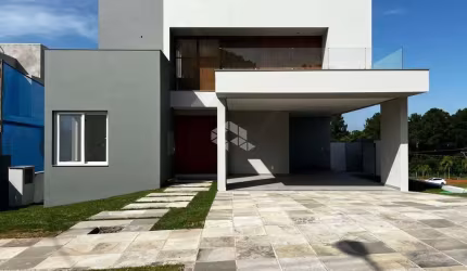 CASA COM ESTILO CONTEMPORÂNEO E ALTO PADRÃO CONSTRUTIVO