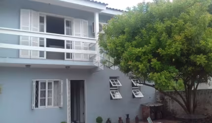Excelente ponto comercial à venda, área privativa de 220 m²,  residência na frente de 2 dormitórios.