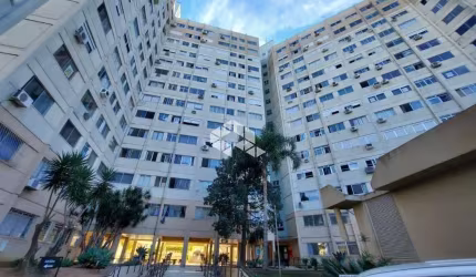Excelente Apartamento com 1 dormitório, andar alto, living 2 ambientes, silencioso, arejado, iluminado, elevador, portaria 24h e bem localizado