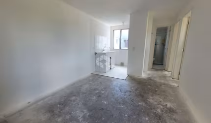 Apartamento semimobiliado de 2 dormitórios com vaga de garagem!