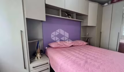Apartamento semi mobiliado 2 dormitorio e vaga escriturada a venda no bairro Partenon.