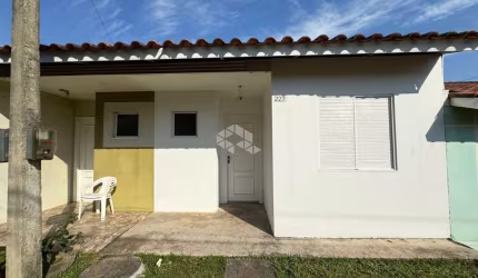 Geminado em condomínio fechado com 2 dormitórios em Santa Cruz do Sul!