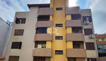 Apartamento central 3 dormitórios com 2 banheiros