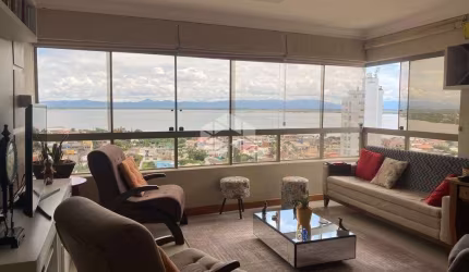 Tramandaí bairro Centro - apartamento 2 dormitórios, suíte e 1 garagem.