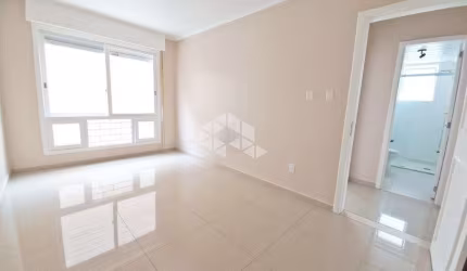 INDEPENDÊNCIA - Apartamento no 1º andar com garagem no Bairro