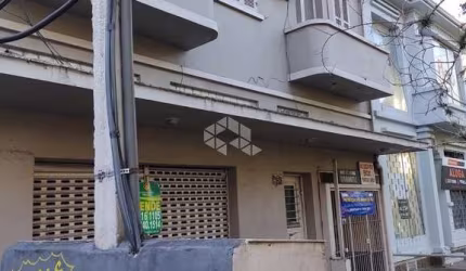 Terreno a venda, com construção residencial antiga, bairro Navegantes