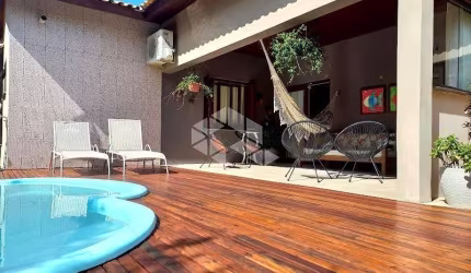 Casa em condomínio fechado com 3 quartos à venda na Estrada Capitão Gentil Machado de Godoy, 4500, Vila Elsa, Viamão, 340 m2 por R$ 980.000