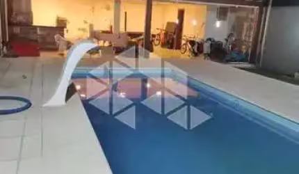Casa com piscina e 03 dormitórios sendo 01 suíte no Bairro Maria Regina em Alvorada.