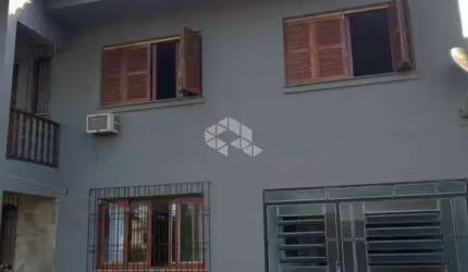 Casa de 03 dormitórios no Bairro Neópolis em Gravataí.