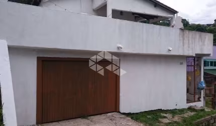 CASA COM 03 DORMITÒRIOS NO BAIRRO AGRONOMIA  EM PORTO ALEGRE.