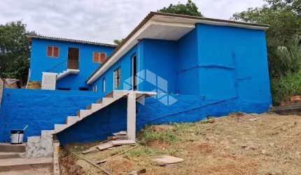01 Casa com  02 kit nets para locação- Viamão
