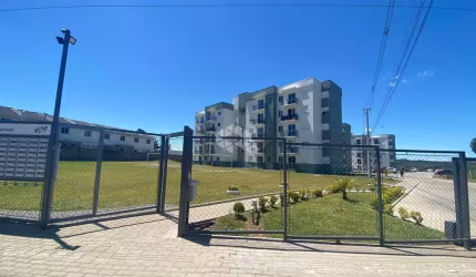 Apartamento à Venda no Bairro Santa Fé com 2 Dormitórios, sacada e vaga de Garagem coberta.