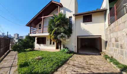 Casa 3 quartos 1 suíte 2 vagas de garagem no bairro Bela Vista