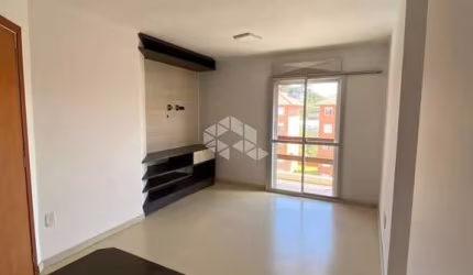 Apartamento com 63m ,3 dormitórios uma vaga de garagem semimobiliado no bairro universitario