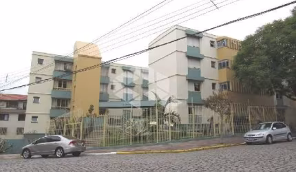 VENDO: Apartamento amplo com  dois quartos, e um box  de garagem no Pio X.