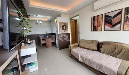 Apartamento  03 dormitórios, sendo 1 suíte, semimobiliado, lareira e churrasqueira a uma quadra da Assis Brasil