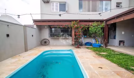 Casa com 5 quartos e 326m² à venda em Alto Petrópolis, Porto Alegre.