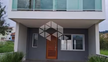 Casa 3 dormitórios sendo 1 suite com sacada 2 vagas de garagem atrás do Zaffari da Hípica -