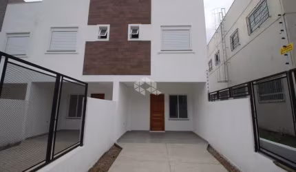 CASA EM CONDOMÍNIO 2 QUARTOS, 1 SUÍTE E 2 VAGAS DE GARAGEM NO BAIRRO NONOAI