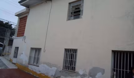 Casa de 4 dormitórios com edícula