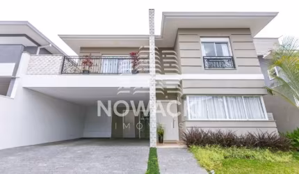 CASA EM CONDOMINIO COM 4 SUITES E 4 VAGAS EM SANTA FELICIDADE