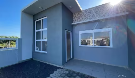 Casa Moderna 2 Dormitórios, 1 suíte - Bairro Centro na praia do Imbé/RS.