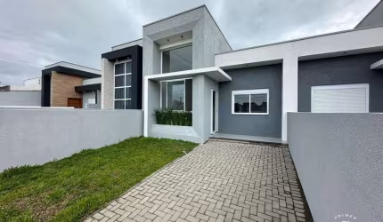 Casa Geminada no centro de Imbé, próximo aos comércios.