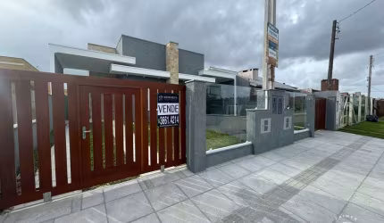 Casa Geminada Térrea, 2 dormitórios sendo 1 suíte, no bairro Zona Nova - Tramand