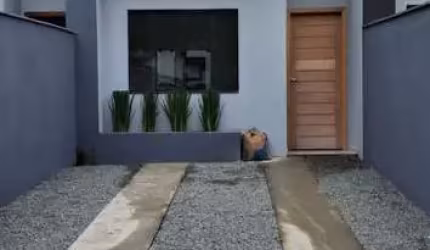 Casa à venda em Joinville-SC no bairro Santo Antônio: 3 quartos, 1 suíte, 2 banheiros, 2 vagas de garagem.