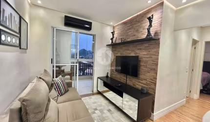 Apartamento com 2 dormitórios à venda, 59 m² por R$ 370.000,00 - Areia Branca - Santos/SP