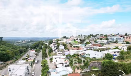 Terreno de Esquina com 02 Casas no Bairro São José em Flores da Cunha